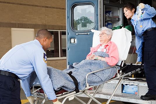 An lady being brought into the hospital 